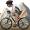 Person Mountain Biking: Medium Skin Tone emoji on Apple iOS 17.4