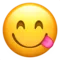 Face Savoring Food emoji on iPhone