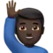 ️ Man Raising Hand: Dark Skin Tone emoji on Apple iOS 17.4