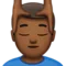 ️ Man Getting Massage: Medium-Dark Skin Tone emoji on Apple iOS 17.4