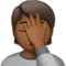 Person der bruger ansigtspalming: Mellem-mørk hudtone emoji på Apple iOS 13.2