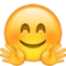 Smiling Face with Open Hands emoji on Apple iOS 9.1