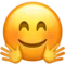 Smiling Face with Open Hands emoji on iPhone