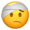 Πρόσωπο με επίδεσμο κεφαλής emoji στο iPhone (iOS 17.4)