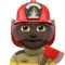 Man Firefighter: Dark Skin Tone emoji on iPhone