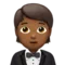 Person in Tuxedo: Medium-Dark Skin Tone emoji on Apple iOS 15.4