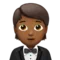 Person in Tuxedo: Medium-Dark Skin Tone emoji on iPhone