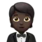 Person in Tuxedo: Dark Skin Tone emoji on iPhone