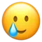 Faccina sorridente con lacrima emoji su Apple iOS 14.2
