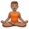 Man in Lotus Position: Medium Skin Tone emoji on iPhone (iOS 14.6)