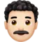 Man: Ljus hudton, lockigt hår emoji på iPhone (iOS 12.2)