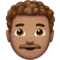 Man: Medium Skin Tone, Curly Hair emoji on Apple iOS 13.2