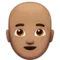 Man: Medium Skin Tone, Bald emoji on iPhone