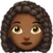 Woman: Medium-Dark Skin Tone, Curly Hair emoji on iPhone