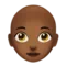 Woman: Medium-Dark Skin Tone, Bald emoji on iPhone (iOS 12.1)