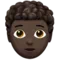 Person: Dark Skin Tone, Curly Hair emoji on Apple iOS 14.2