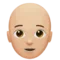 Person: Medium-Light Skin Tone, Bald emoji on iPhone (iOS 14.6)