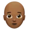 Person: Medium-Dark Skin Tone, Bald emoji on Apple iOS 14.5