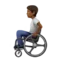 Person in Manual Wheelchair: Medium-Dark Skin Tone emoji on Apple iOS 17.4