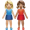 牵手的女性：中等偏浅肤色，中等肤色 iPhone 上的表情符号 (iOS 14.2)