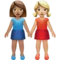 牵手的女性：中等肤色，中浅肤色 iPhone 上的表情符号 (iOS 16.4)