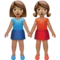 牵手的女性：中等肤色 iPhone 上的表情符号 (iOS 14.2)
