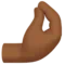 Pinched Fingers: Medium-Dark Skin Tone emoji on iPhone