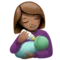 哺乳妇女：中等肤色 iPhone 上的表情符号 (iOS 14.2)