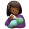 Woman Feeding Baby: Medium-Dark Skin Tone emoji on iPhone