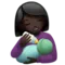 Woman Feeding Baby: Dark Skin Tone emoji on iPhone