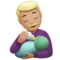 男子喂婴儿：中等偏浅肤色 iPhone 上的表情符号 (iOS 16.4)