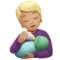 Person Feeding Baby: Medium-Light Skin Tone emoji on Apple iOS 16.4