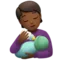 Person Feeding Baby: Medium-Dark Skin Tone emoji on iPhone