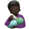 Person Feeding Baby: Dark Skin Tone emoji on iPhone (iOS 14.6)