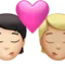 Kiss: Person, Person, Light Skin Tone, Medium-Light Skin Tone emoji on iPhone