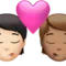 Kiss: Person, Person, Light Skin Tone, Medium Skin Tone emoji on iPhone