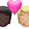 ️ Kiss: Person, Person, Dark Skin Tone, Medium-Light Skin Tone emoji on Apple iOS 15.4