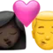 ️ Kiss - Woman: Dark Skin Tone, Man: No Skin Tone emoji on Apple iOS 17.4