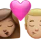 ️ Kiss: Woman, Man, Medium Skin Tone, Medium-Light Skin Tone emoji on Apple iOS 17.4