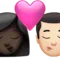 Kiss: Woman, Man, Dark Skin Tone, Light Skin Tone emoji on iPhone