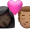 Kiss: Woman, Man, Dark Skin Tone, Medium Skin Tone emoji on iPhone