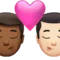 Kiss: Man, Man, Medium-Dark Skin Tone, Light Skin Tone emoji on iPhone