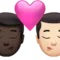 Kiss: Man, Man, Dark Skin Tone, Light Skin Tone emoji on iPhone
