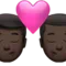 Kiss: Man, Man, Dark Skin Tone emoji on iPhone