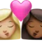 Kiss: Woman, Woman, Medium-Light Skin Tone, Medium-Dark Skin Tone emoji on iPhone