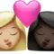️ Kiss: Woman, Woman, Medium-Light Skin Tone, Dark Skin Tone emoji on Apple iOS 17.4
