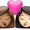 Kiss: Woman, Woman, Medium Skin Tone, Light Skin Tone emoji on iPhone