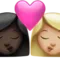 Kiss: Woman, Woman, Dark Skin Tone, Medium-Light Skin Tone emoji on iPhone