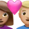 心形情侣：女性、男性、中等肤色、中等偏浅肤色 iPhone 上的表情符号 (iOS 16.4)