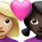 Couple with Heart: Woman, Woman, Medium-Light Skin Tone, Dark Skin Tone emoji on iPhone